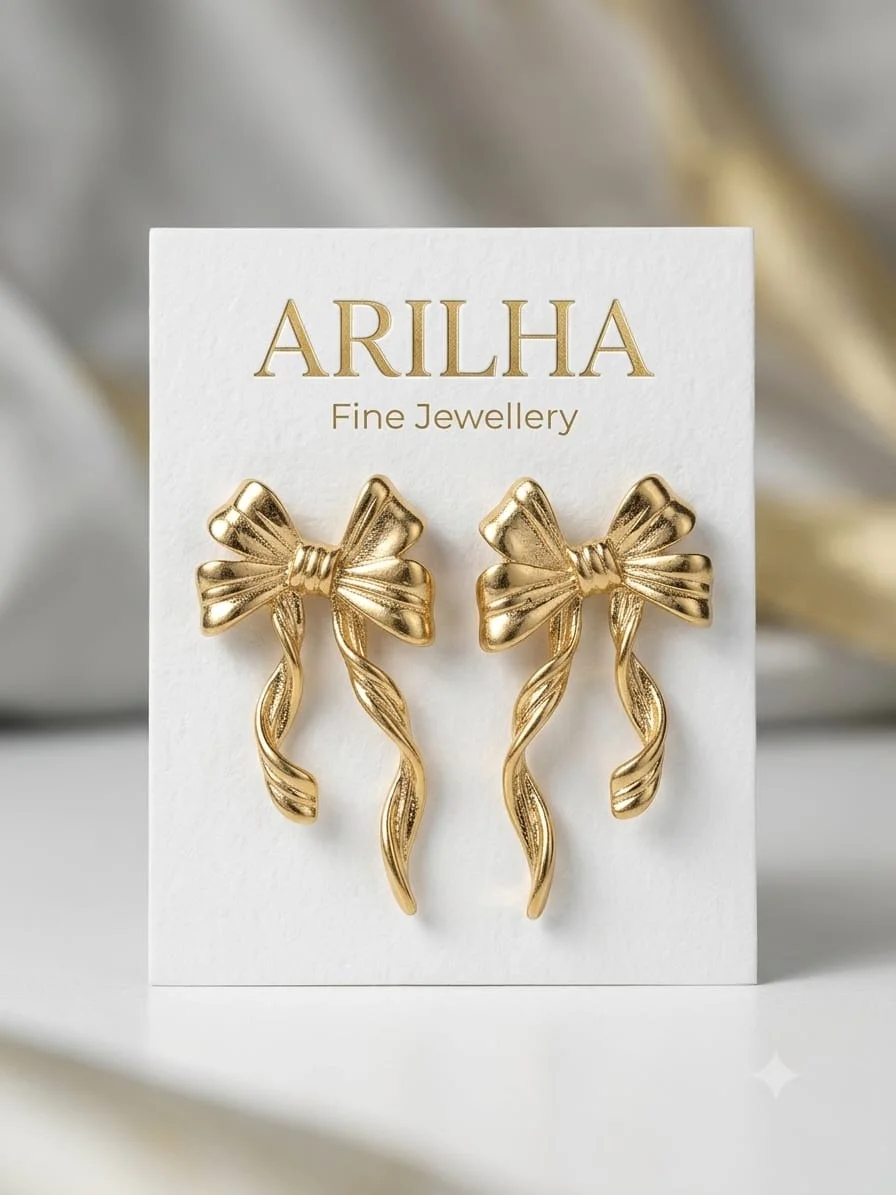 Gold Bow Dangle Earrings | Elegant Statement Jewellery detail view 2